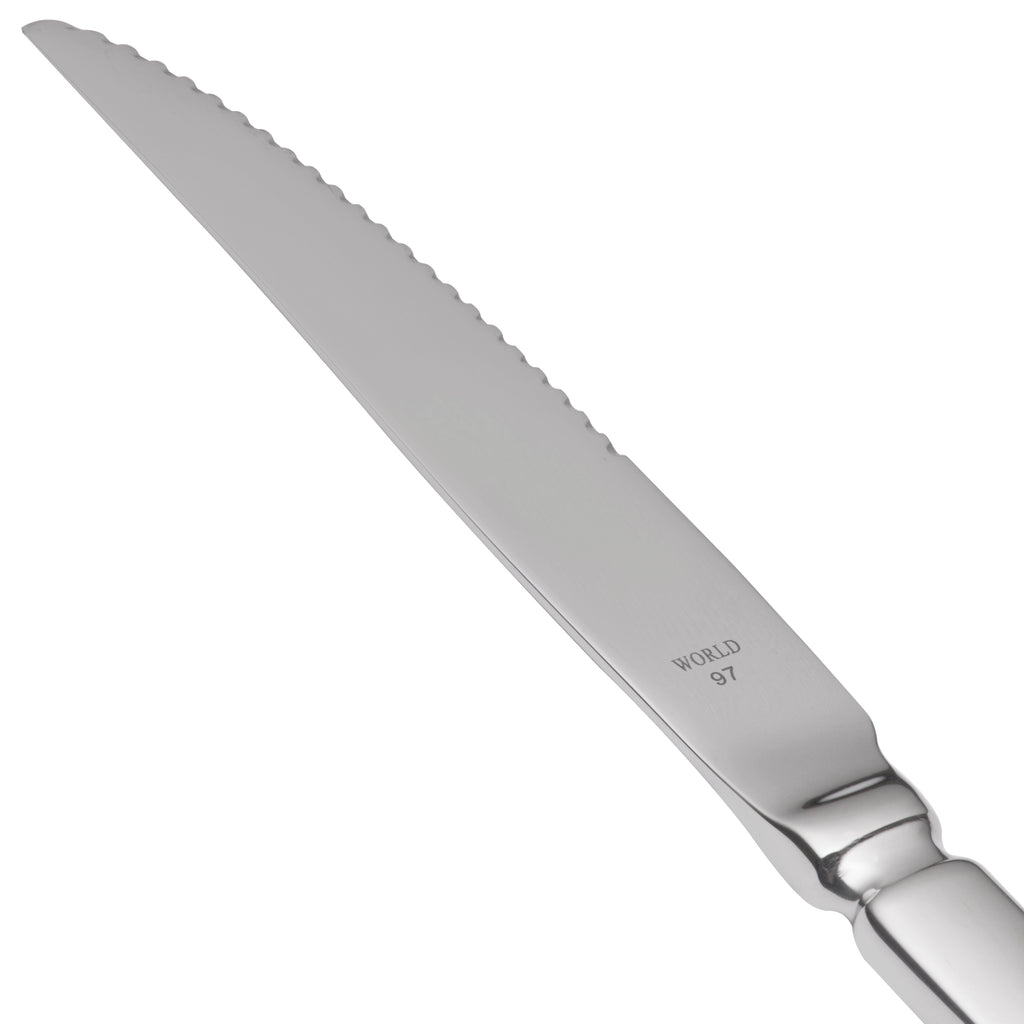 World Tableware 213 5762 Baguette 9" 18/0 Stainless Steel Heavy Weight Fluted Solid Handle Steak Knife - 12/Pack