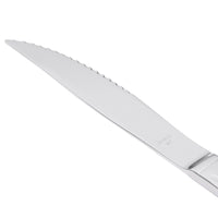 World Tableware 256 5762 Cortland 8 7/8" 18/0 Stainless Steel Heavy Weight Fluted Solid Handle Steak Knife - 12/Pack