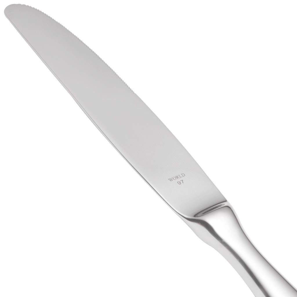 World Tableware 213 2701 Baguette 9 3/4" 18/0 Stainless Steel Heavy Weight Serrated Hollow Handle Dinner Knife - 12/Pack