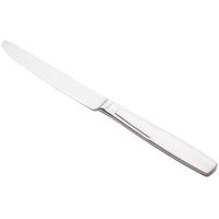 World Tableware 989 5501 Quantum 9 1/2" 18/0 Stainless Steel Heavy Weight Solid Handle Dinner Knife with Serrated Blade - 12/Pack