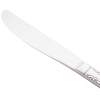World Tableware 901 5262 Lady Astor 8 1/4" 18/0 Stainless Steel Heavy Weight Solid Handle Entree Knife with Fluted Blade - 12/Pack