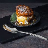 Reed & Barton RB124-002 R&B Soho 7 3/8" 18/10 Stainless Steel Extra Heavy Weight Dessert Spoon - 12/Pack