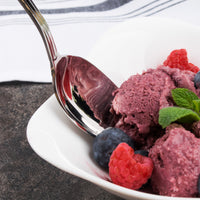 Acopa Saxton 7 7/16" 18/0 Stainless Steel Heavy Weight Oval Bowl Dinner / Dessert Spoon - 12/Pack