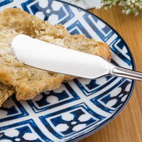 Acopa Saxton 6 5/16" 18/0 Stainless Steel Heavy Weight Butter Spreader - 12/Pack