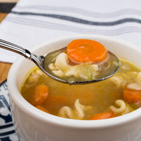 Acopa Harmony 6 7/8" 18/8 Stainless Steel Extra Heavy Weight Bouillon Spoon - 12/Pack