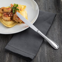 Acopa Saxton / Scottdale 9 5/8" 18/0 Stainless Steel Heavy Weight Dinner Knife - 12/Pack