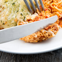 World Tableware 998 5502 Farmhouse 9 7/8" 18/0 Stainless Steel Heavy Weight Solid Handle Dinner Knife with Fluted Blade - 12/Pack