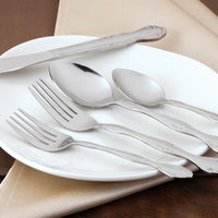 Walco 4607 Windswept 7 1/2" 18/0 Stainless Steel Heavy Weight Dessert Spoon - 12/Pack