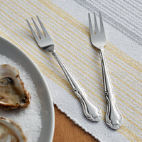 Choice Bethany 5 3/4" 18/0 Stainless Steel Oyster / Cocktail Fork - 12/Pack